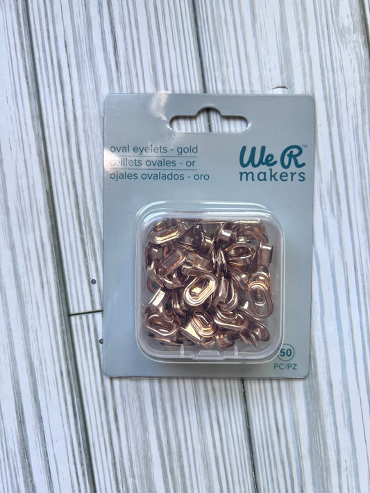 Oval Eyelets.  Gold Color Set of 50 Eyelets with Maching Washers. We R Makers.